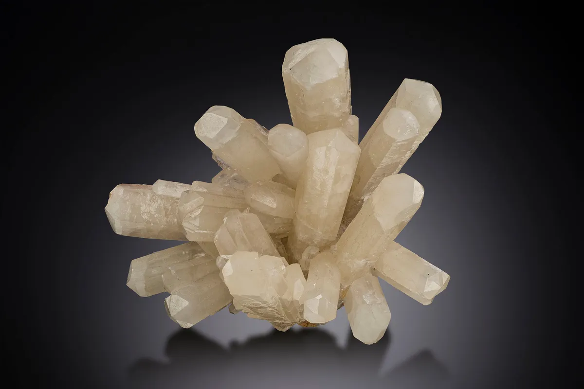 Aragonite: A stellate spray of pseudo-hexagonal trillings of aragonite (variety tarnowitzite). 75 mm specimen. Private Collection.
