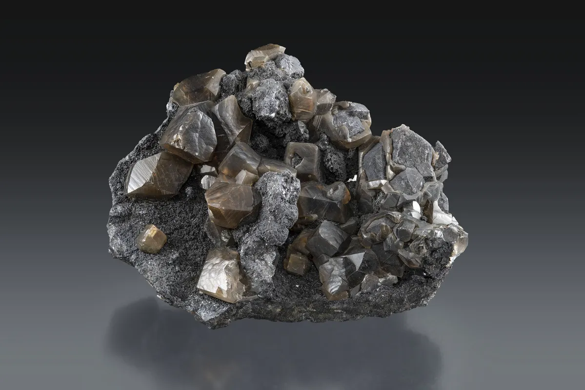 Exhibit 1. Smithsonite (on galena); 60 mm.